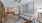 a living room with a large painting