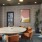 a clubhouse room with a table and chairs
